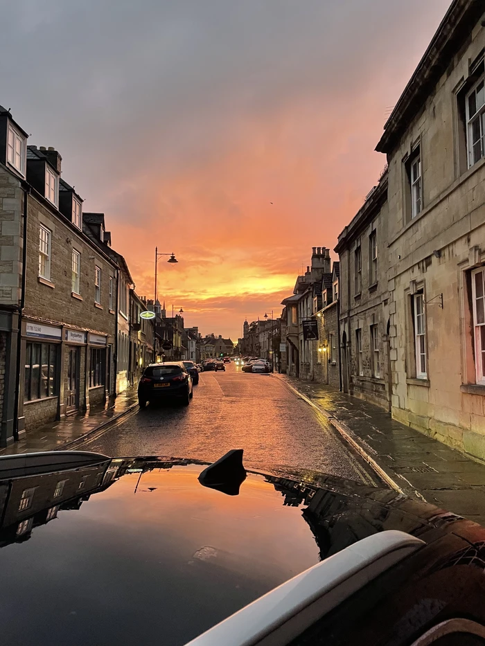 Sunset view down a wet Broad Street iin Stamford